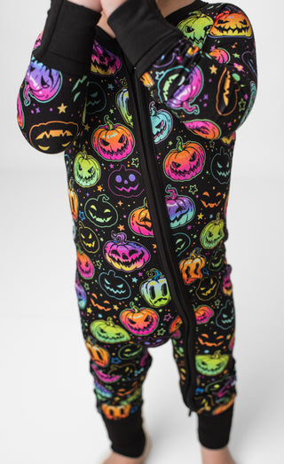 Bamboo zipper pajamas for babies and toddlers in glowing neon Halloween Pumpkins print 